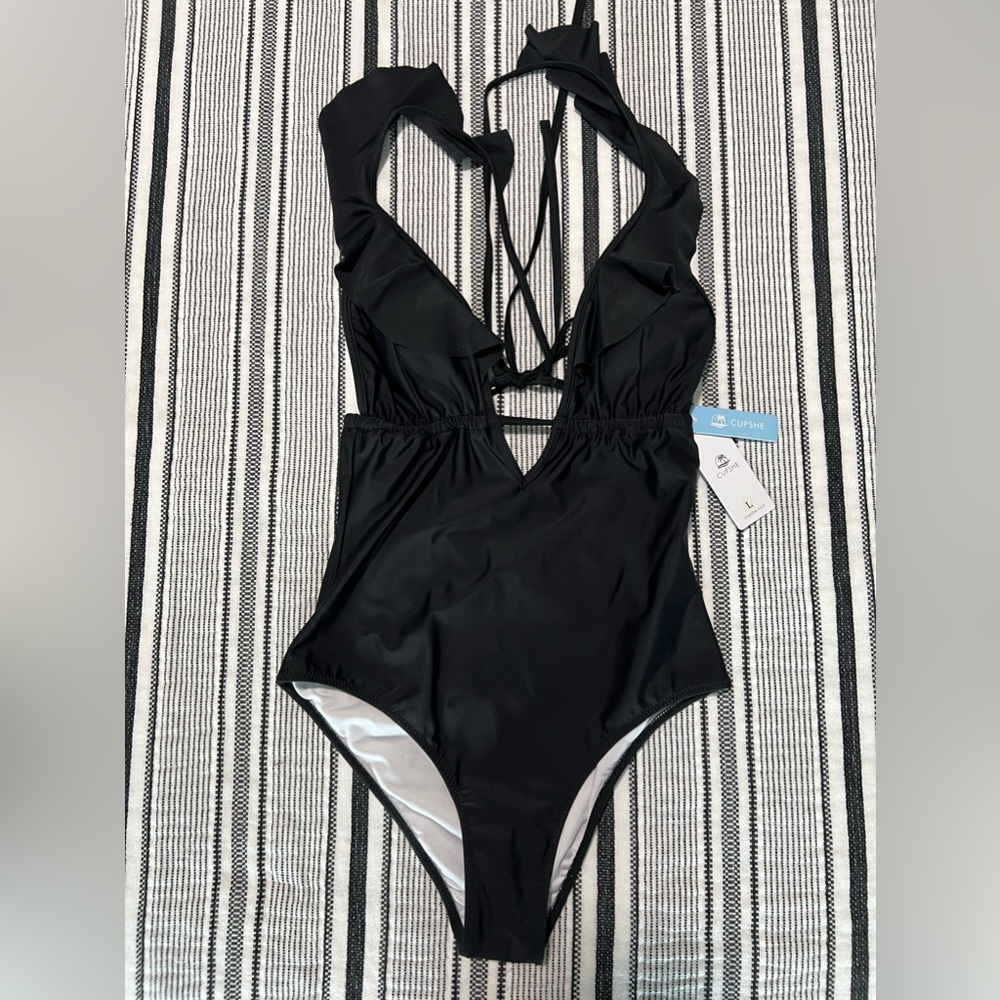 Black Cupshe one piece with ruffles. Size large. New with tags.